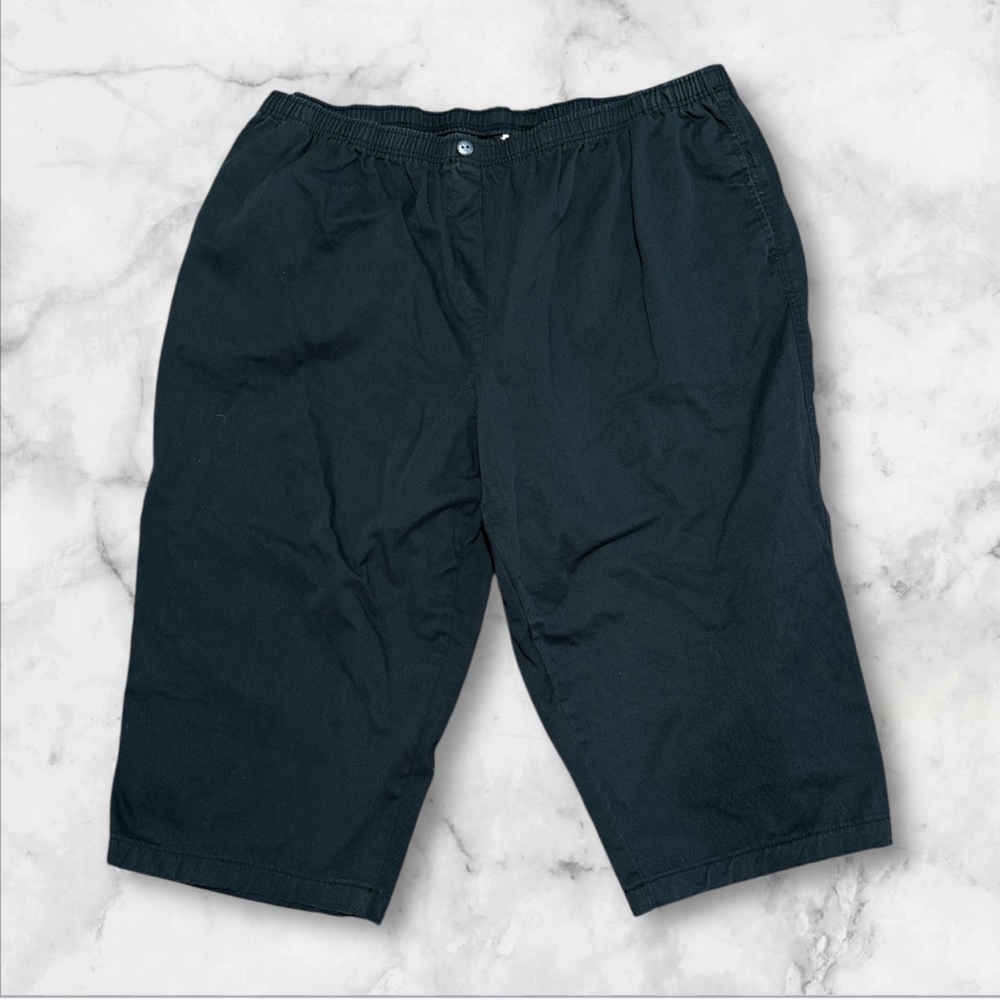 Woman within black elastic waist Capri pants size 30w